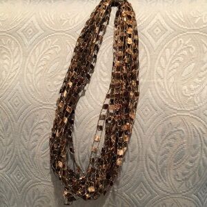 Hand made by local Illinois artist. Ribbon necklace. Approximately 12” long.